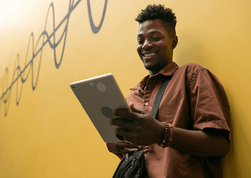 A freelancer working on a tablet